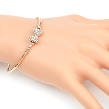 Rose Tone Bangle Bracelet With Swarovski Style Crystal Bow - $27.99