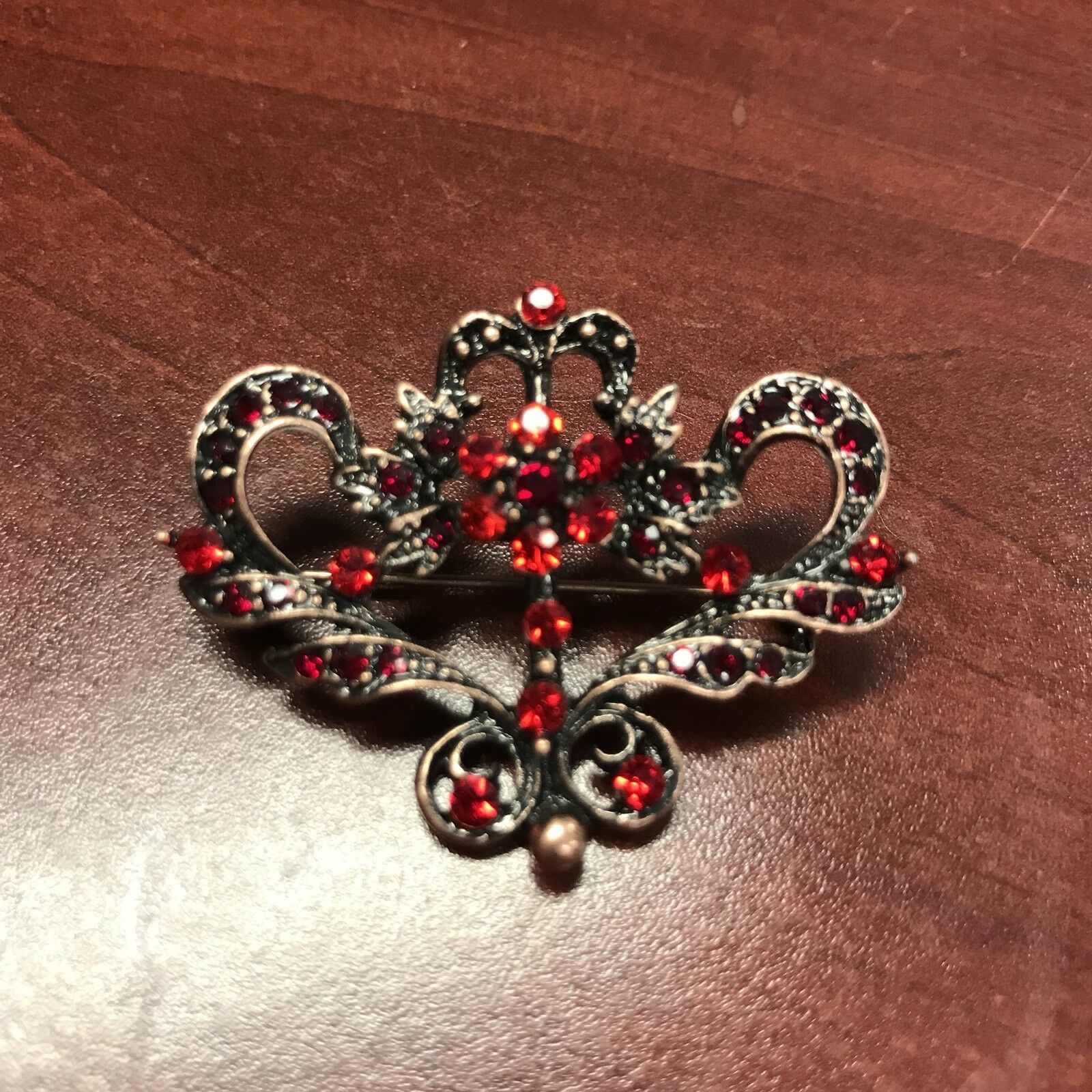 Primary image for NEW Fashion Jewelry Red Rhinestone Brooch Pin Copper Tone Classic