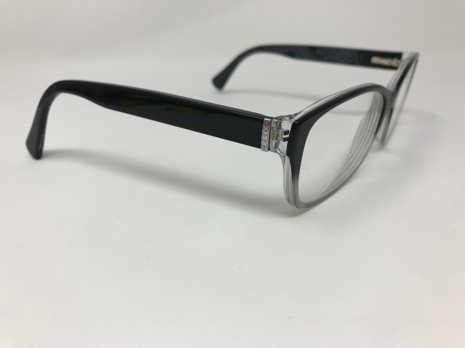 RALPH LAUREN Eyeglasses Frame RA7064 1427 52-16-135 Black Clear Fade ...