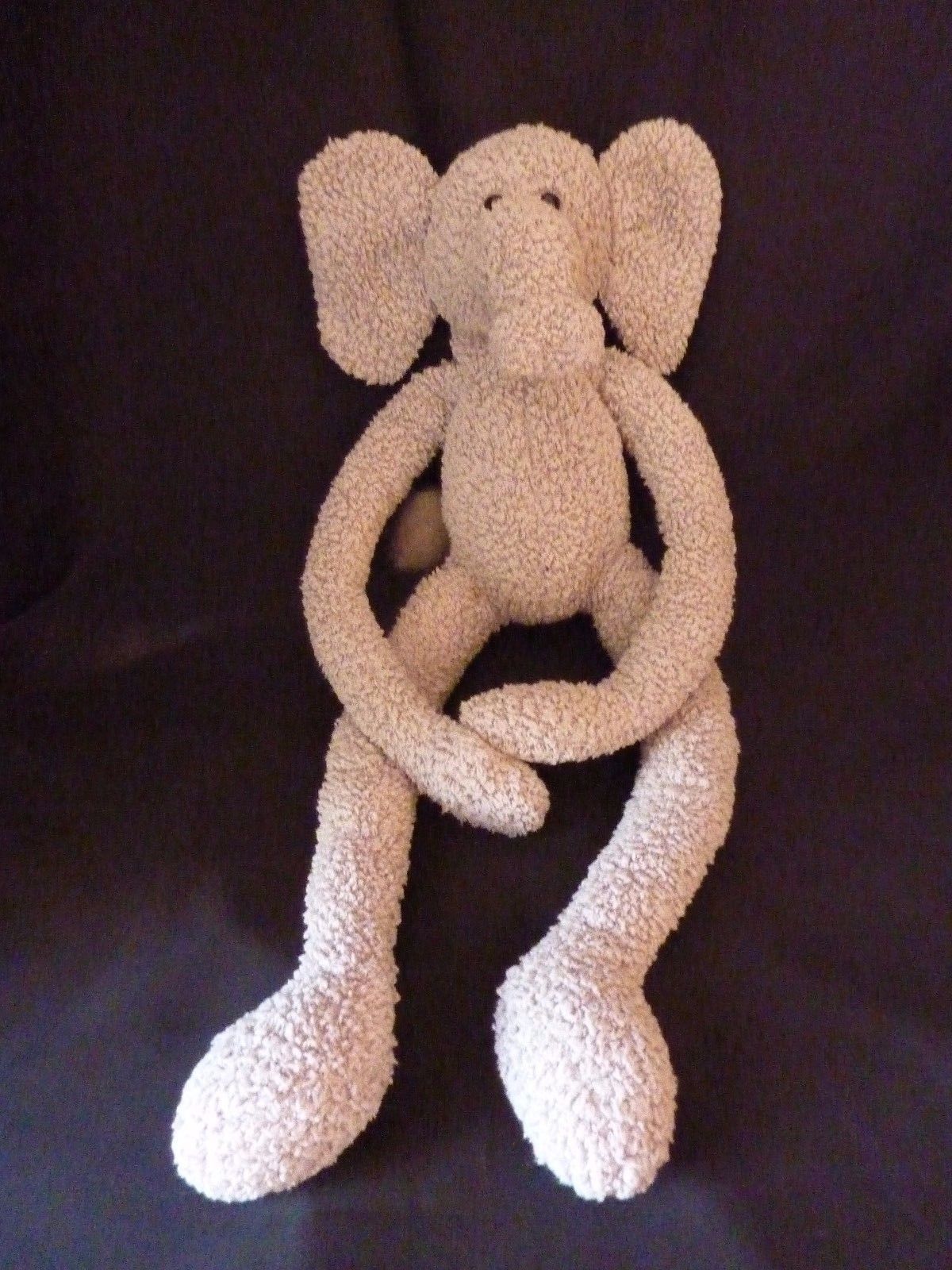 stuffed animals with long arms and legs