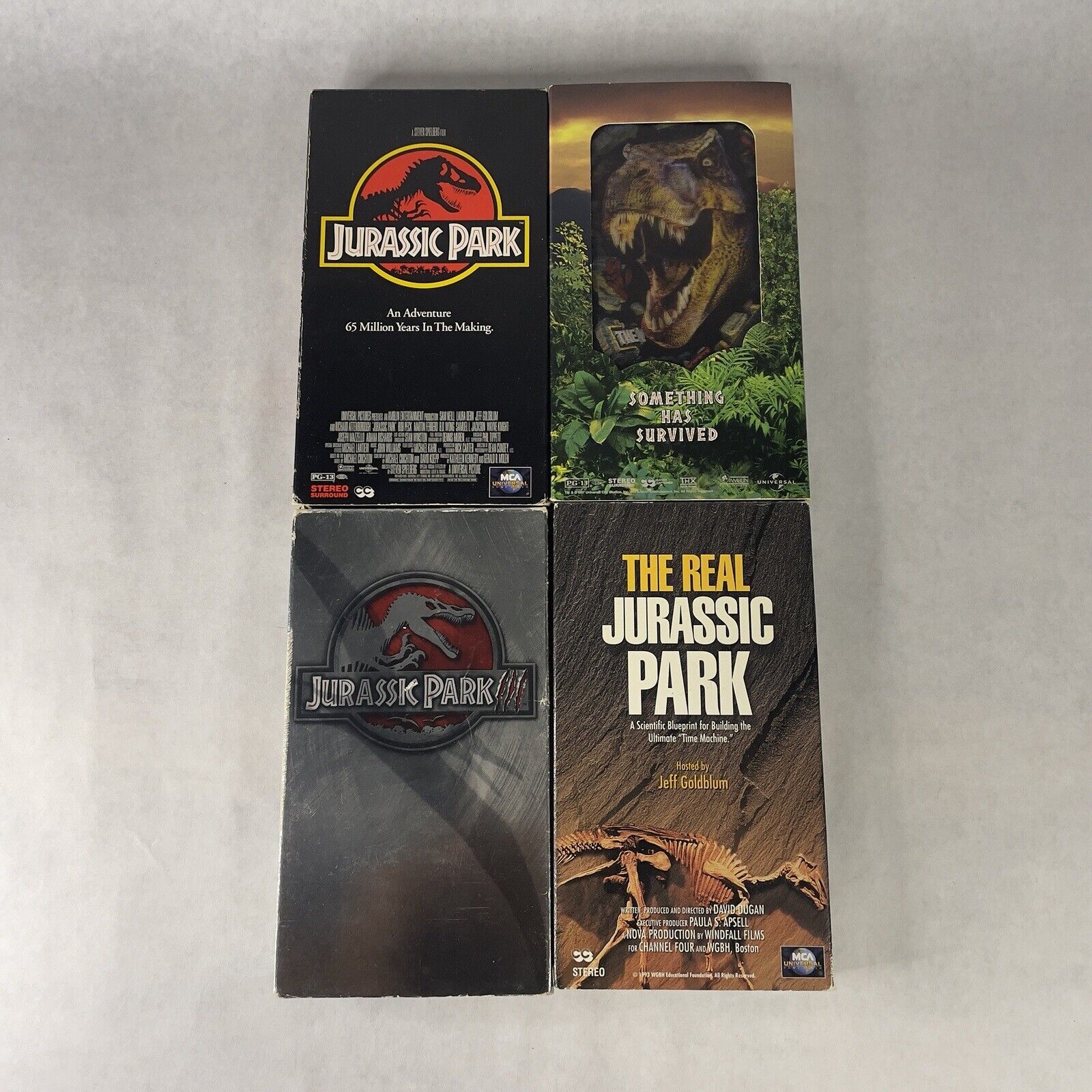 4 VHS Lot Jurassic Park, Lost World, Jurassic Park III, The Real