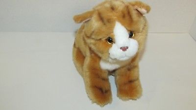 orange and white stuffed cat