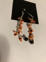 pierced earrings orange black white beaded dangle - $29.99