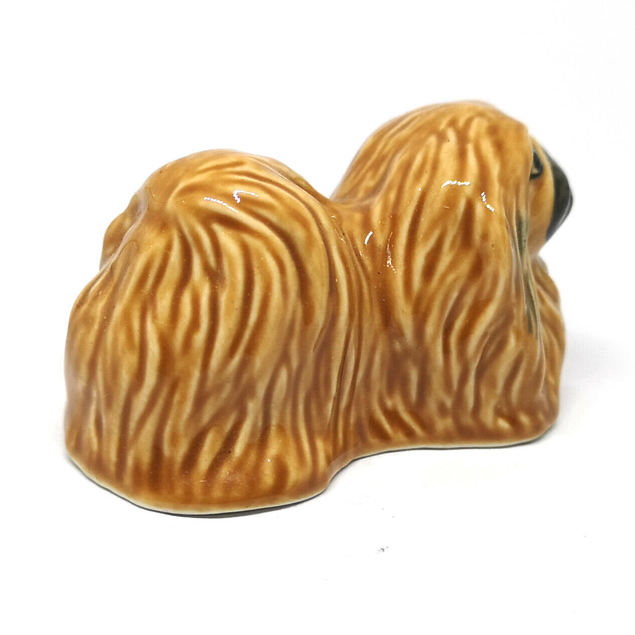 porcelain pekingese figurines