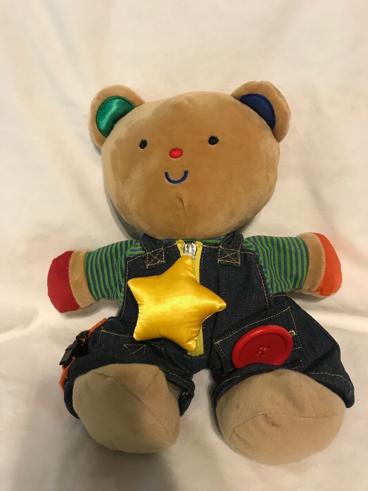 teddy bear with zippers and buttons