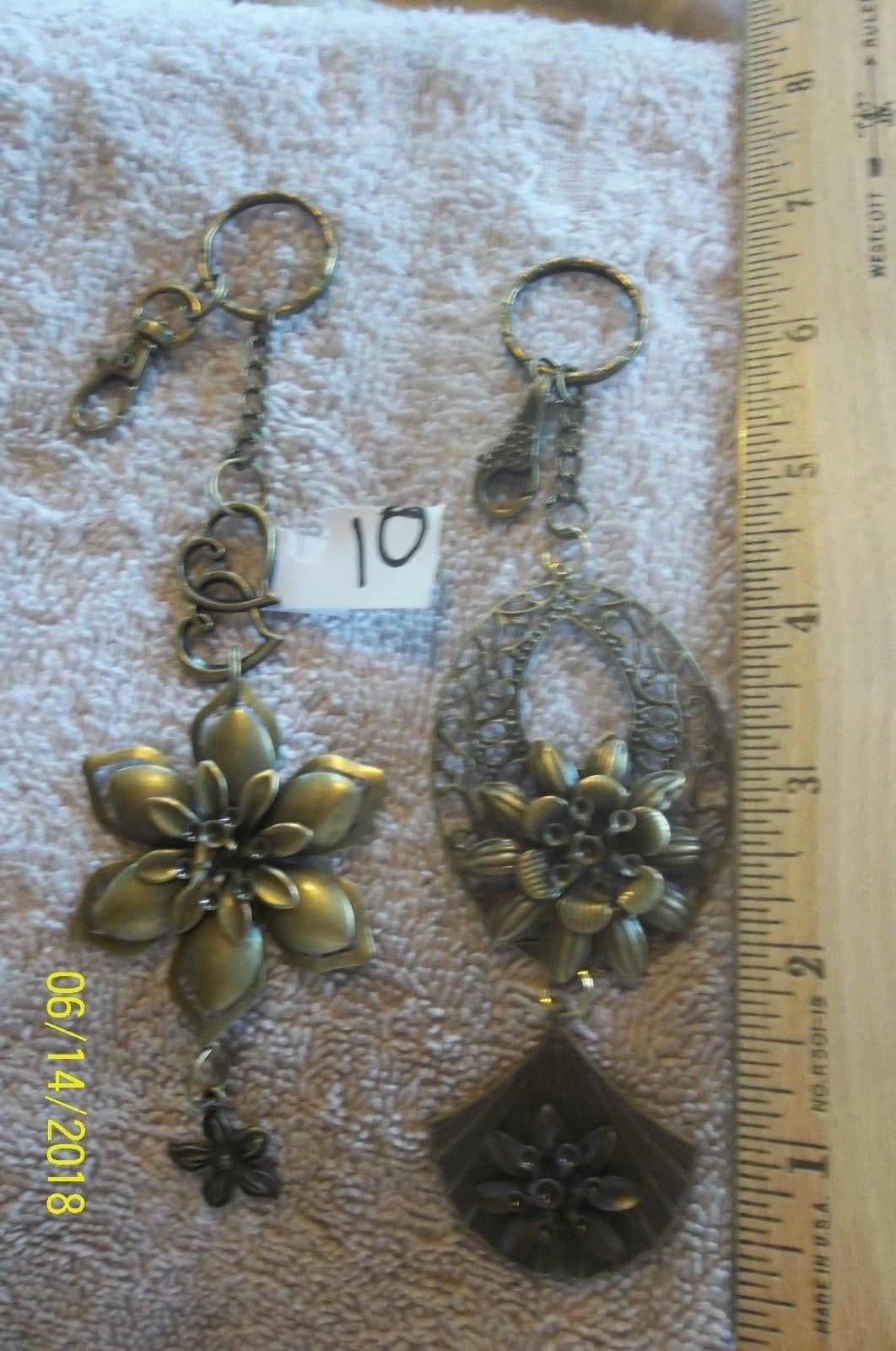 Primary image for <><  purse jewelry bronze color keychain backpack filigree charm  10 lot of 2