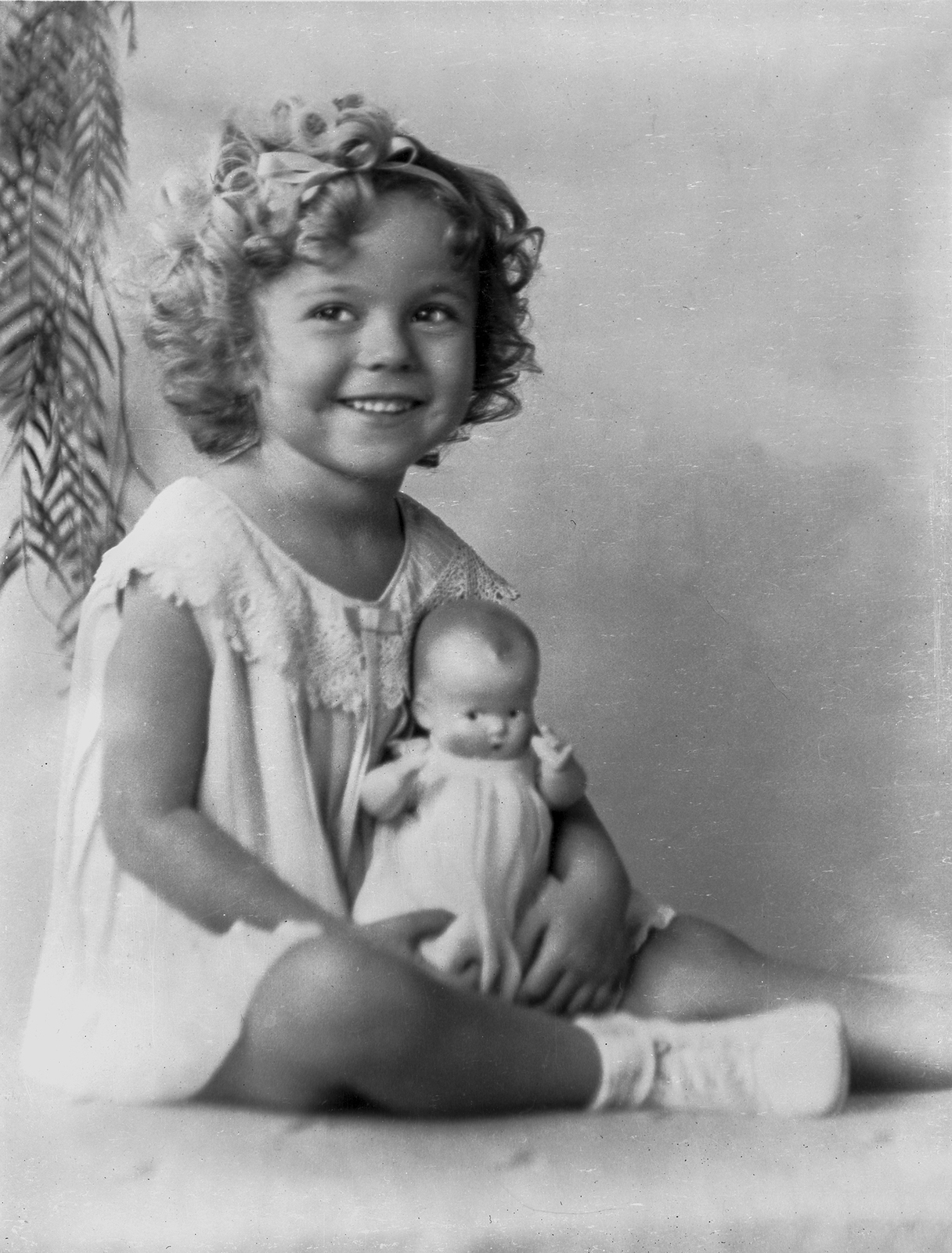 Shirley Temple Posed Holding Doll, An Archival Print - Art Photographs