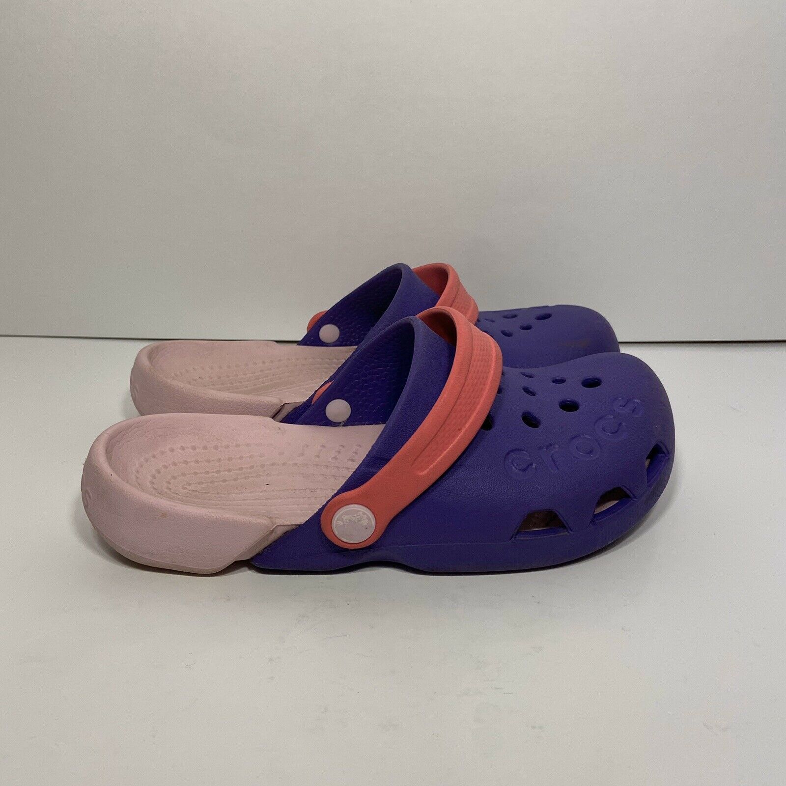 purple and pink crocs