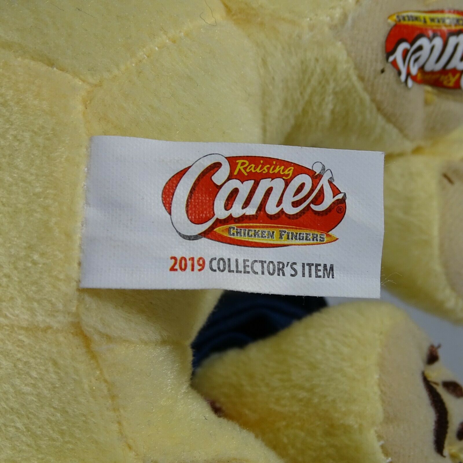 raising canes plush puppy