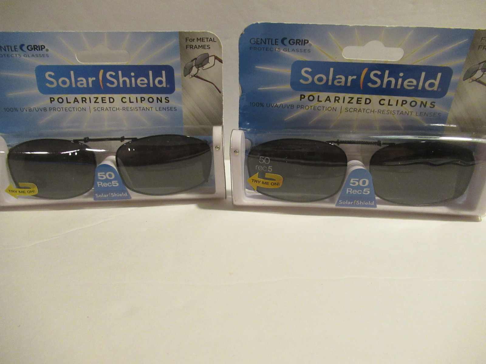 Solarshield - 2 piece solar shield clip on sunglasses 50 rec 5 new