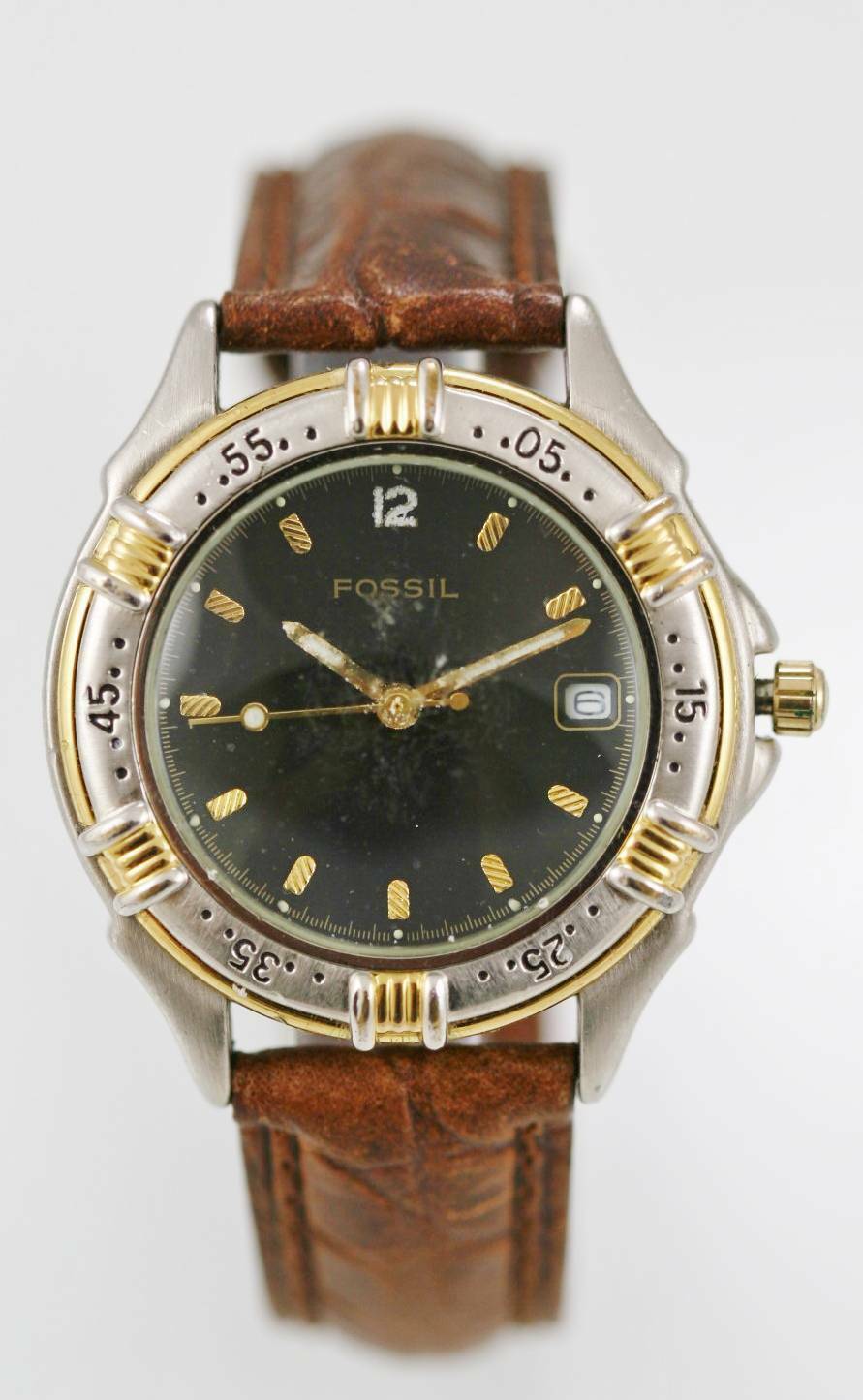 gold and silver fossil watch men's