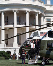 President George W. Bush boards Marine One helicopter at White House Photo Print - $8.99
