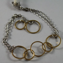 .925 RHODIUM SILVER AND YELLOW GOLD PLATED BRACELET WITH CIRCLES image 1