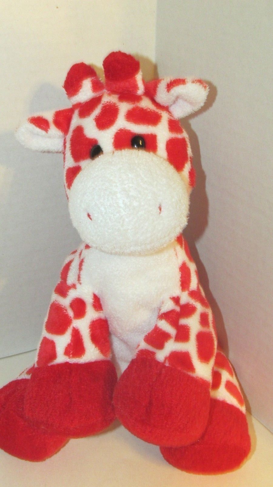 red giraffe stuffed animal