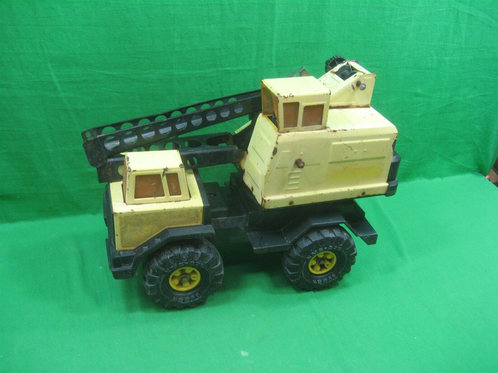 yellow metal tonka truck