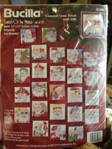 1996 Bucilla Santas of the World Christmas Cross Stitch Kit Ornaments Set of 25 - $24.74
