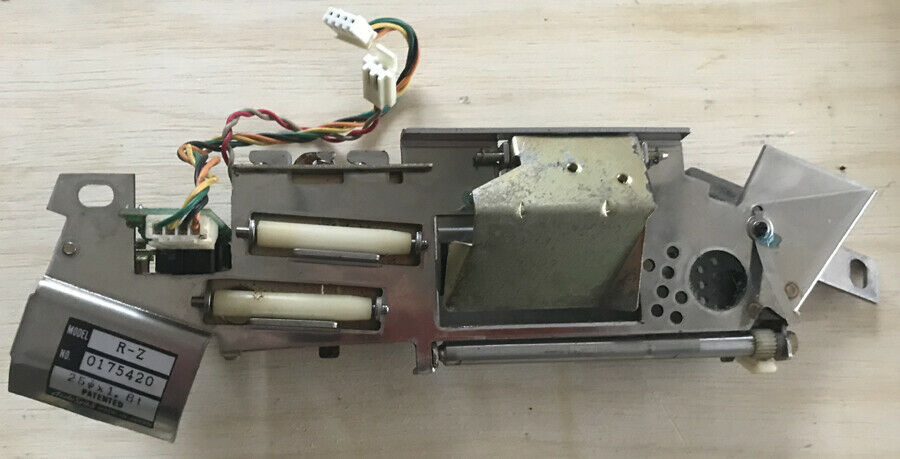 japanese slot machine coin mechanism