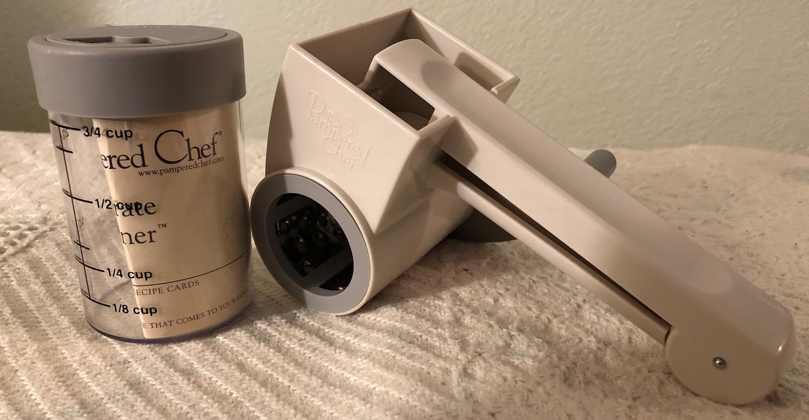 The Pampered Chef Retired Rotary Grater W/ 2 drums and cheese storage