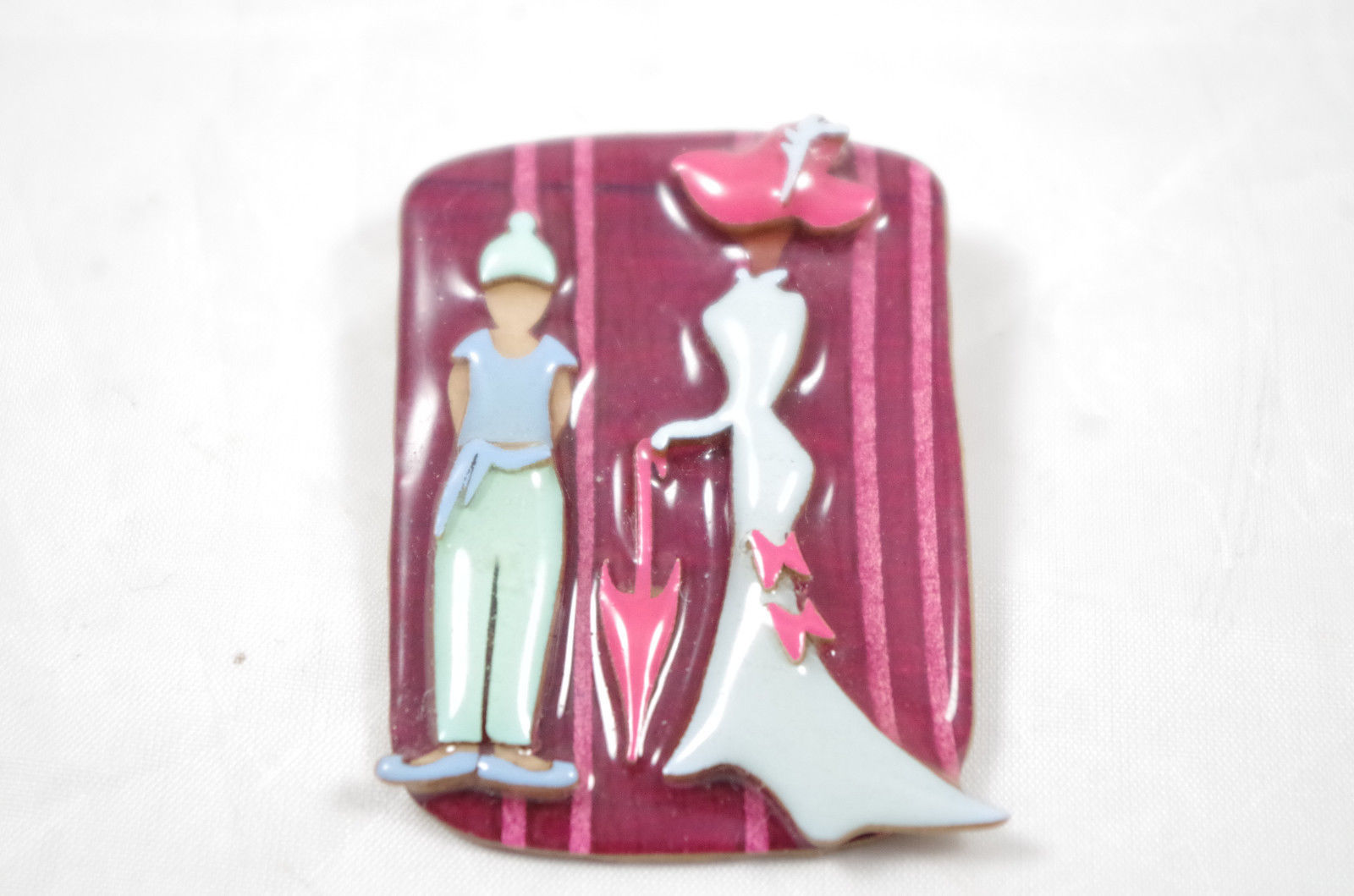Woman Pins Designs by Lucinda Lady in White with Maid Brooches, Pins