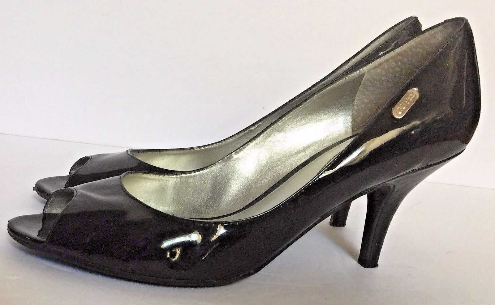 guess black patent leather pumps