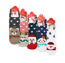 Women's Pack of 12 Holiday Gift Festive Christmas Pattern Santa Winter Socks image 3
