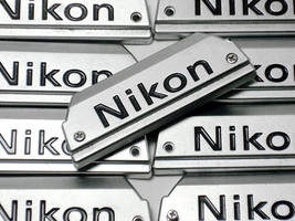 Genuine NEW NIKON FG Camera Chrome Front Name Plate Replacement Part w/S... - $12.95