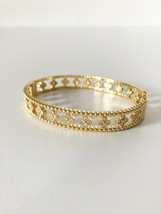 Small Floral Openwork Bangle in Gold and Cubic Zirconia - $75.00