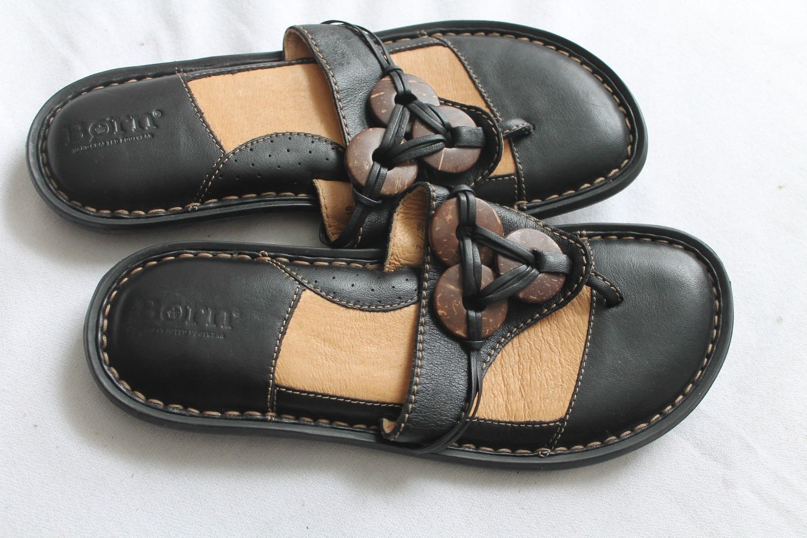 born black leather flip flops