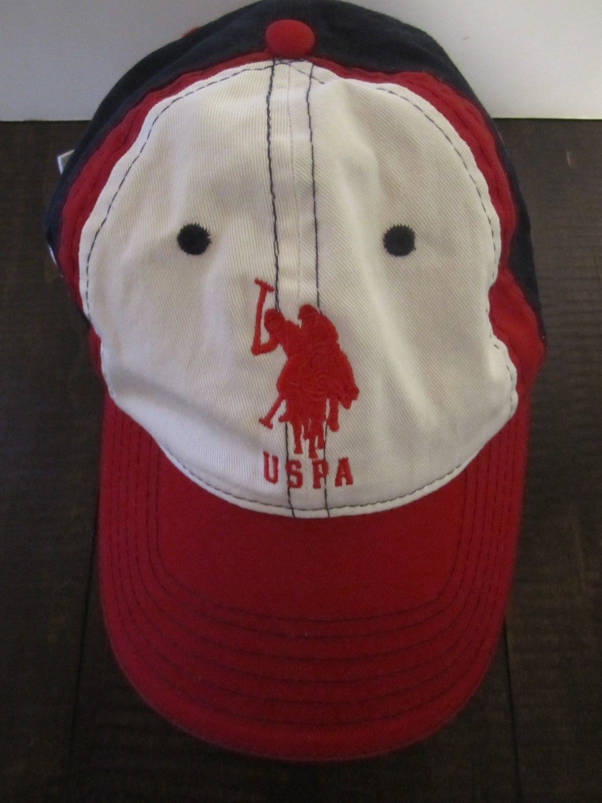 red white and blue polo hat