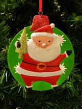 Santa Holding Christmas Tree Spring Back W/ Snowflake Design Ball Xmas Ornament - $9.88