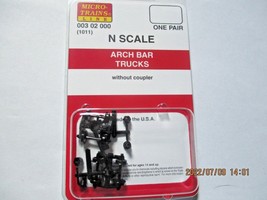 Micro-Trains # 00302000 Arch Bar Trucks without Couplers. 1 Pair. N-Scale image 1