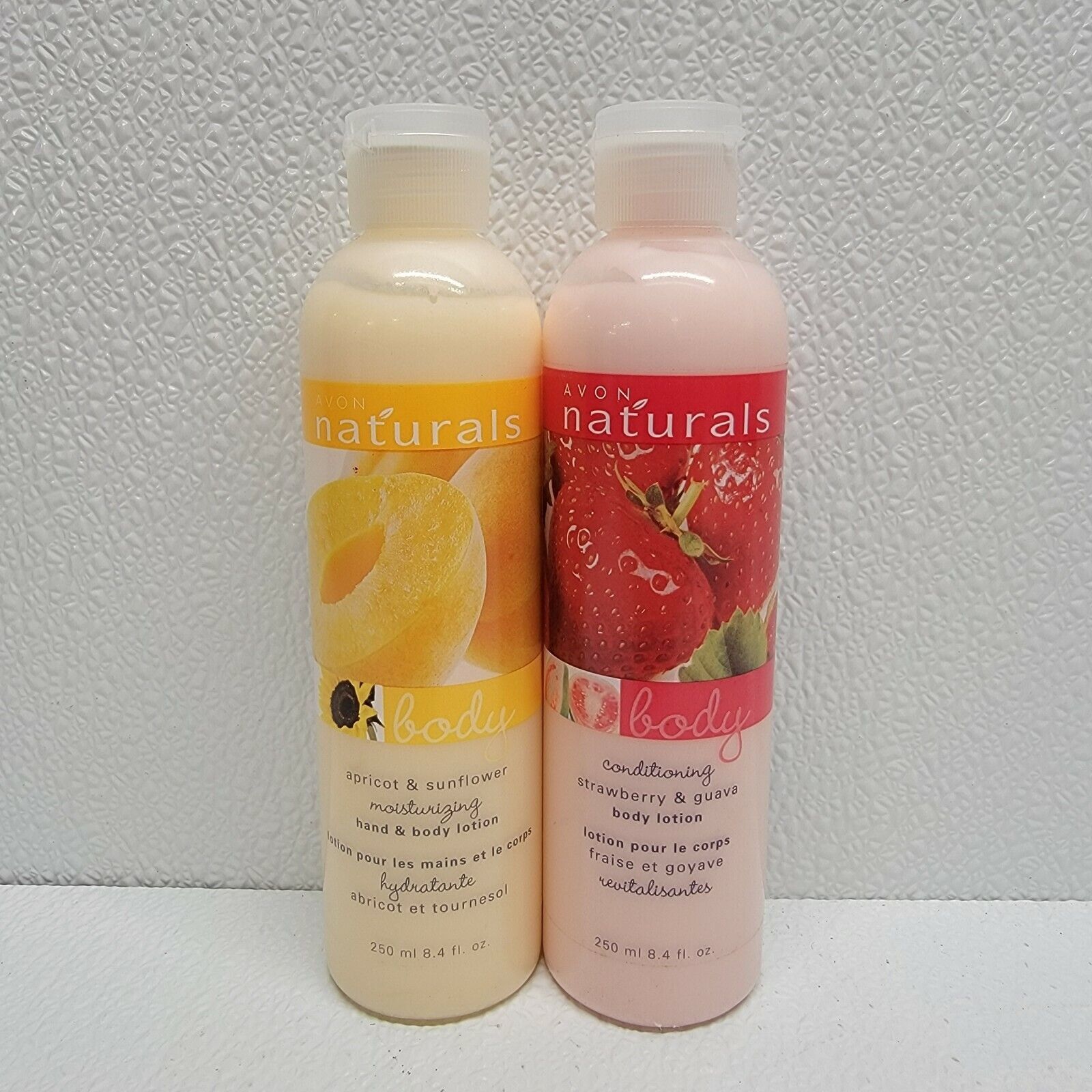 Primary image for AVON Natural Strawberry & Guava - Apricot & Sunflower - Body Lotion 8.4 oz NEW