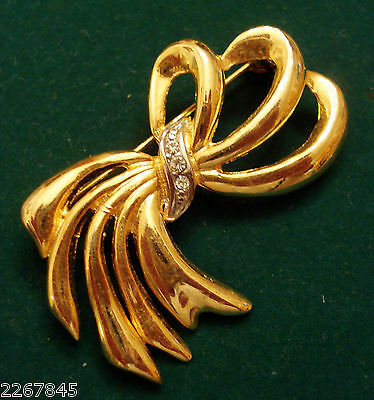 Primary image for Gloria Vanderbilt Ribbon Pin Crystal Rhinestone Brooch Bold Gold Plate Swan Mark