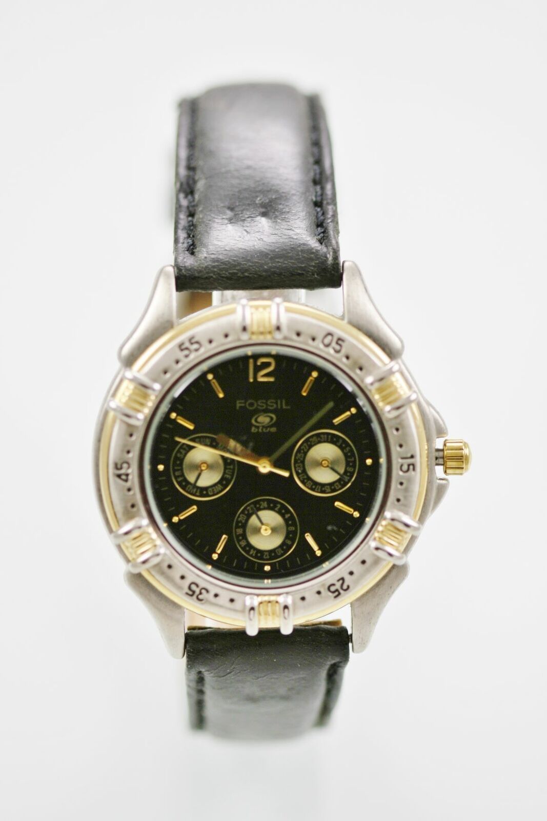 gold and silver fossil watch men's
