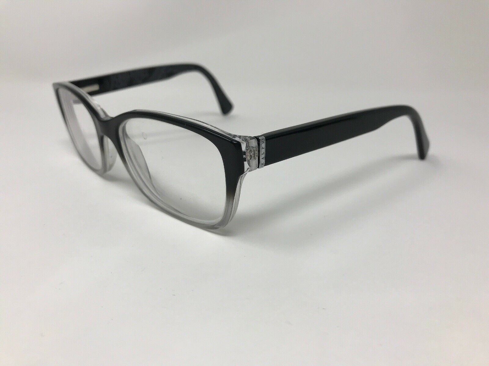 RALPH LAUREN Eyeglasses Frame RA7064 1427 52-16-135 Black Clear Fade ...