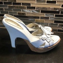 Jessica Simpson butterfly wooden heels - $36.63