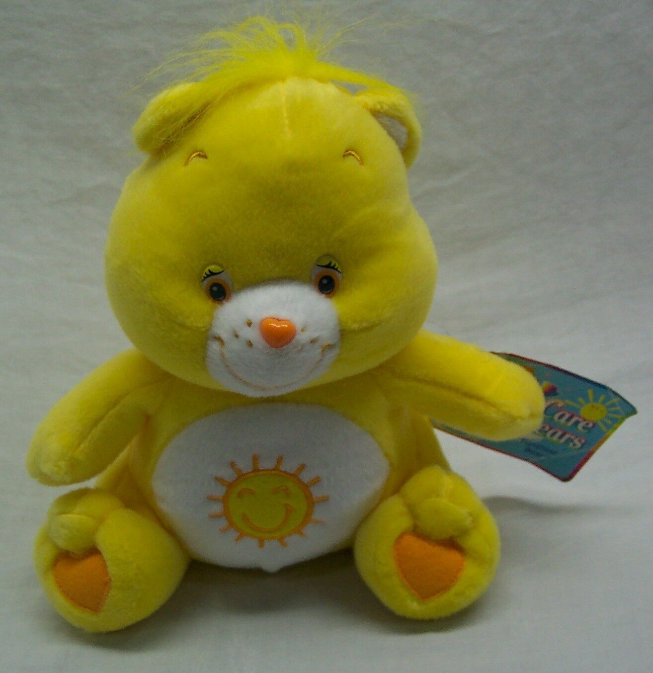 small stuffed care bears