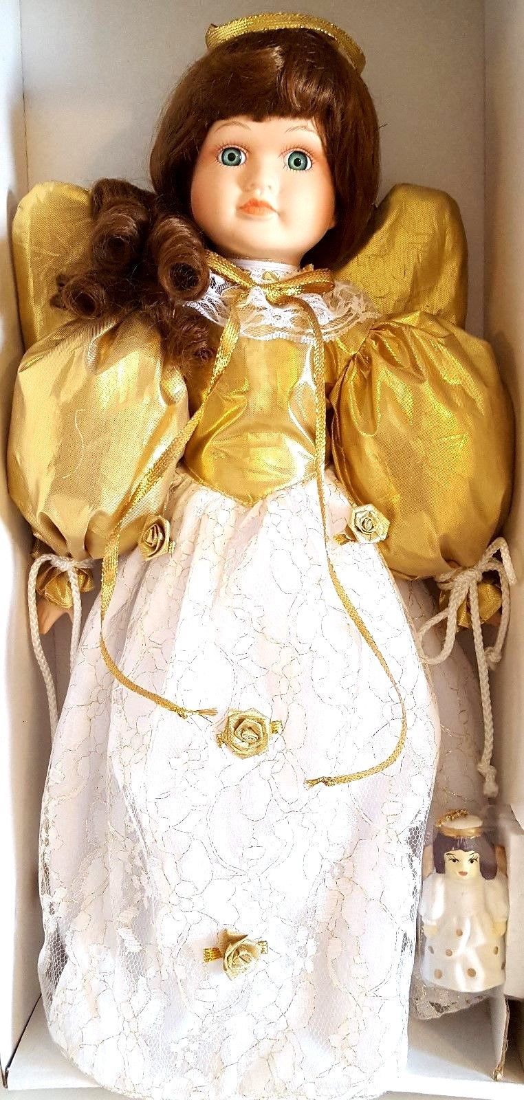 limited collection genuine porcelain doll and matching miniature ornament