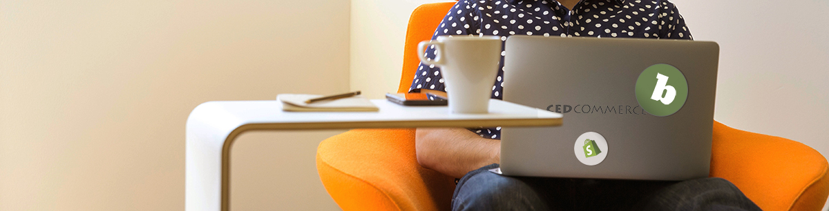 person wearing polkda dot shirt sitting with laptop on lap