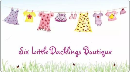 A welcome banner for Six Little Ducklings Boutique