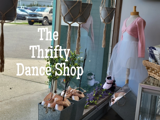 A welcome banner for The Thrifty Dance Shop