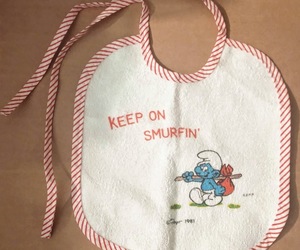 Smurf Baby Bib, Keep on Smurfin&#39; Vintage 1970&#39;s unused, an item from the 'Smurfing Right Along' hand-picked list