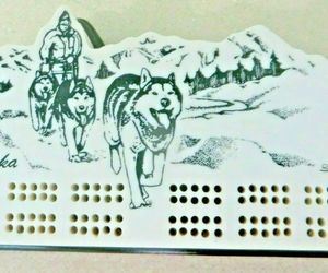 Alaska sled team dogs in Mountains artist signed Lee, cribbage board &amp; pegs game, an item from the 'North to Alaska' hand-picked list