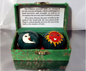 Green Chiming Chinese Sun &amp; Moon Ball Hand Stress Relief Set, an item from the 'Self Care for Tough Days' hand-picked list