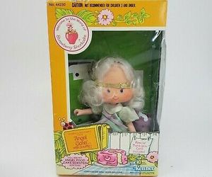 VINTAGE KENNER STRAWBERRY SHORTCAKE FRIEND ANGEL CAKE SOUFFLE PET DOLL IN BOX, an item from the 'Vintage Strawberry Shortcake Dolls' hand-picked list