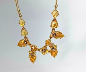Vintage Signed Monet Amber Rhinestones Teardrop Floral Necklace, an item from the 'Elegant Amber' hand-picked list