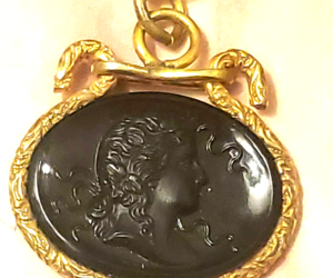 Antique Glass Cameo Pendant with Gold Tone Border on 16&quot; Chain, an item from the 'Classic Cameos' hand-picked list