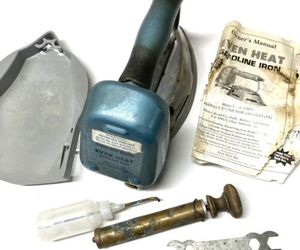 Vintage Even Heat Butane Old Fashioned Clothes Iron Model 9100 Untested, an item from the 'Vintage Household Collectibles' hand-picked list