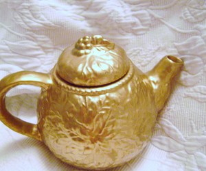 Ceramic Gold Teapot with Azure Blue Interior, an item from the 'Golden Treasures' hand-picked list