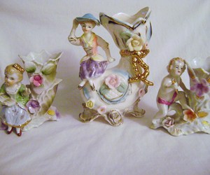 Vintage Victorian Style Vases with attached Figures, an item from the 'Victorian Elegance' hand-picked list